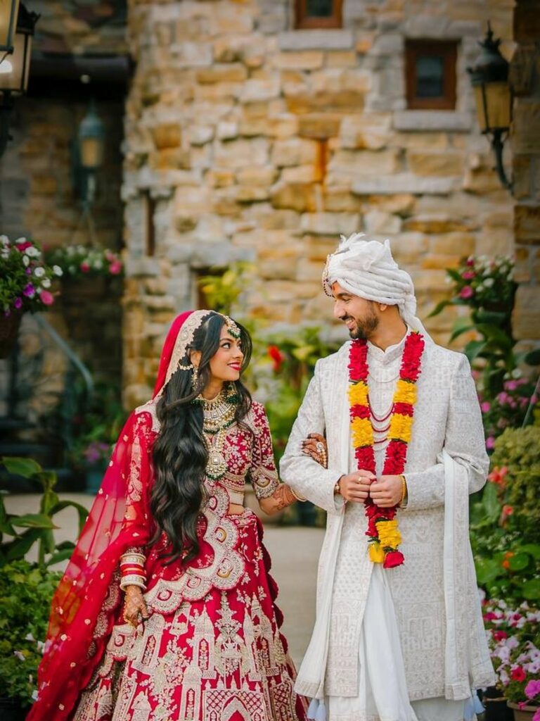 Bride and groom celebrating at their San Jose Indian wedding by Gear6Studios